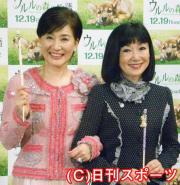 「ウルル松居棒」を持って作品をＰＲする松居一代（左）と鳩山幸首相夫人
