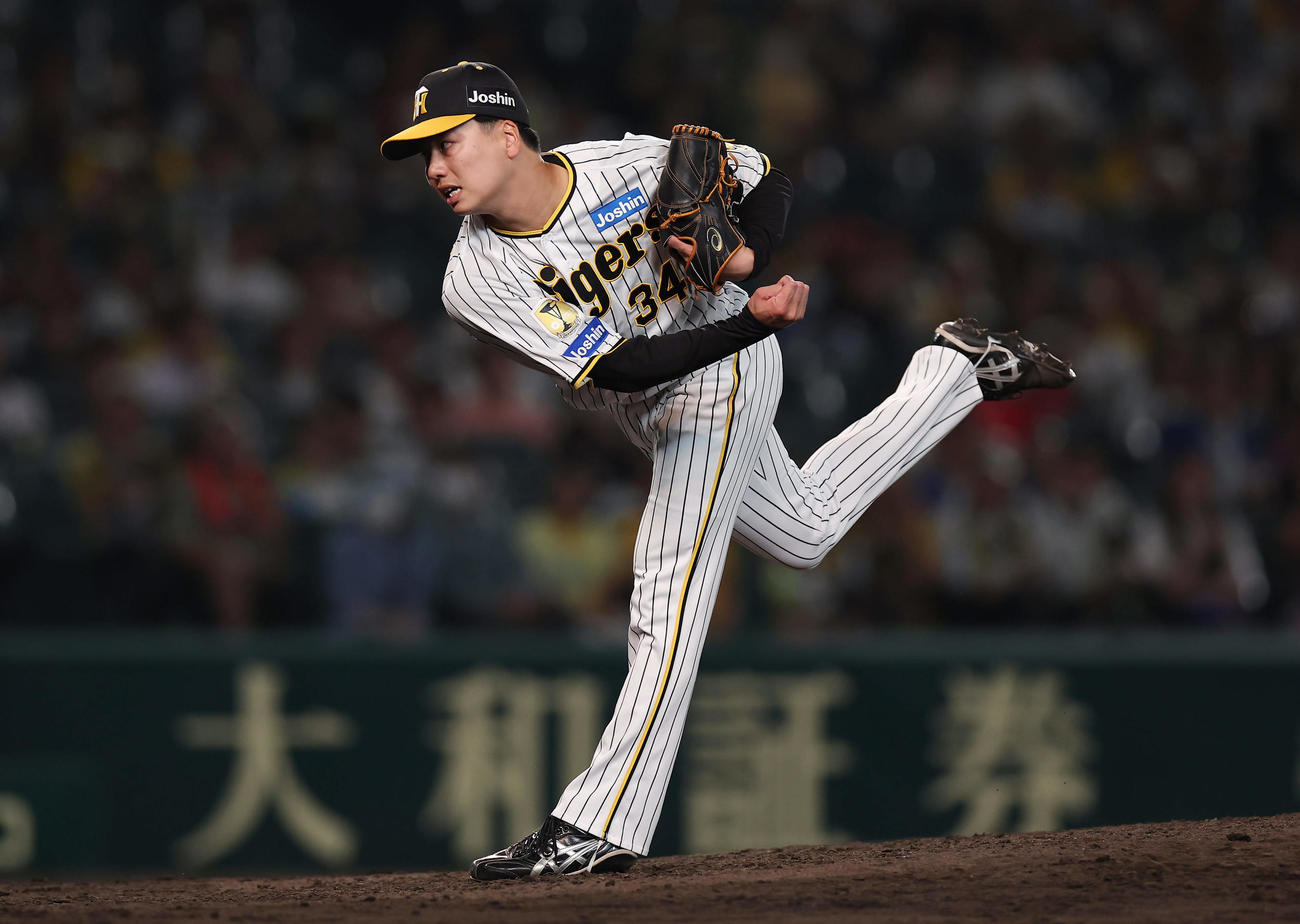 阪神対中日　力投する阪神6番手の漆原（撮影・前田充）