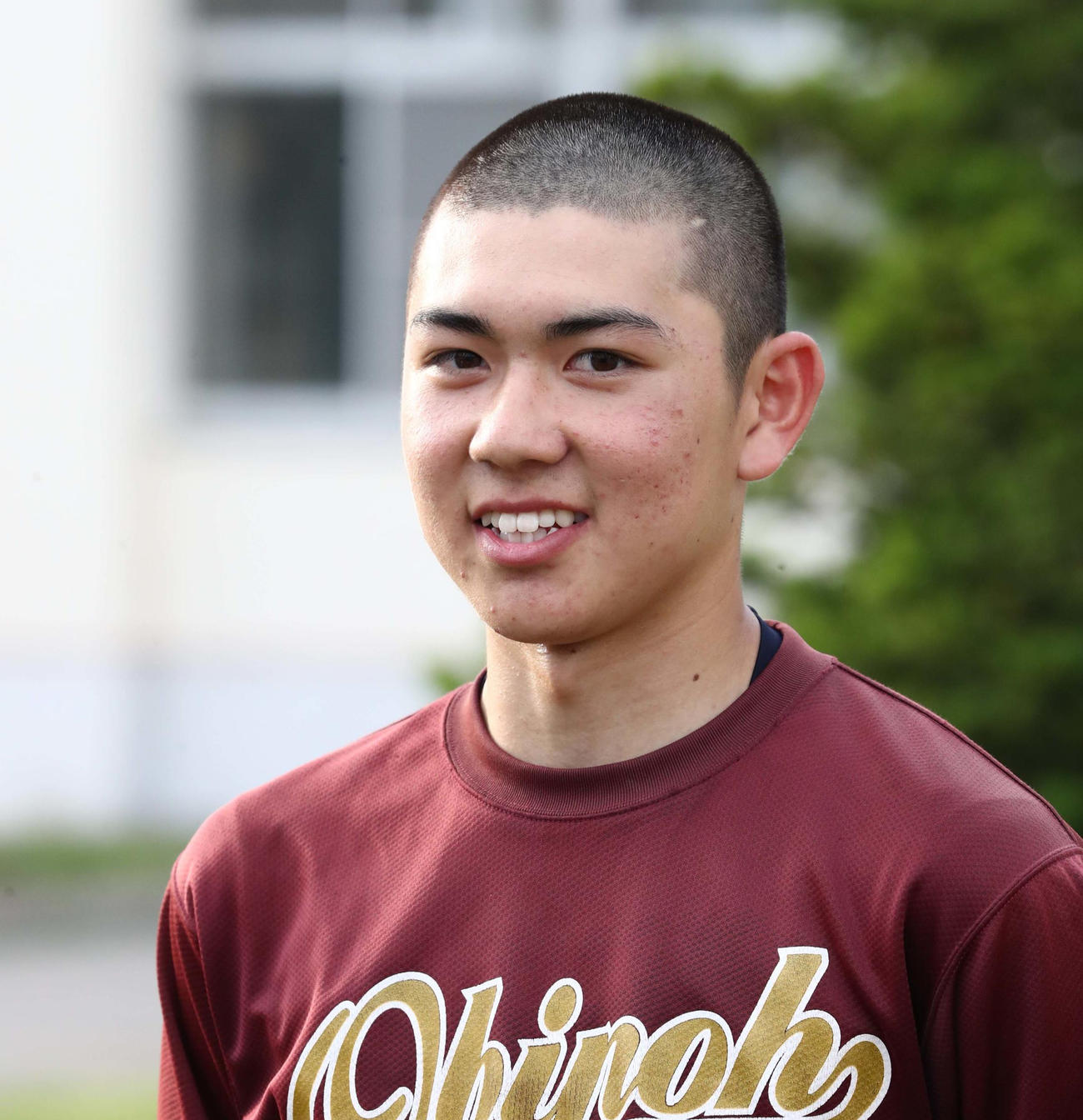 甲子園高校野球交流試合に出場が決まり笑顔の井村主将（撮影・黒川智章）
