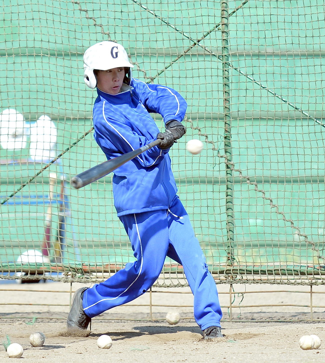 崎はジャージー姿で練習