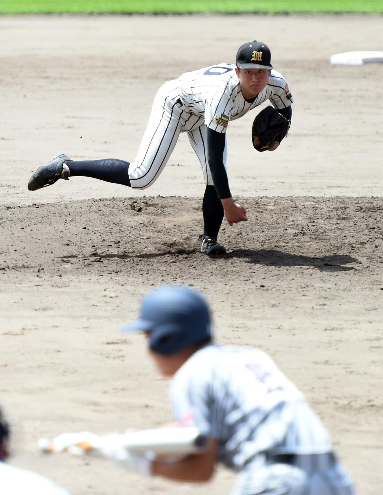 明桜対秋田修英　6回1失点と好投した明桜先発・橘高（撮影・山田愛斗）