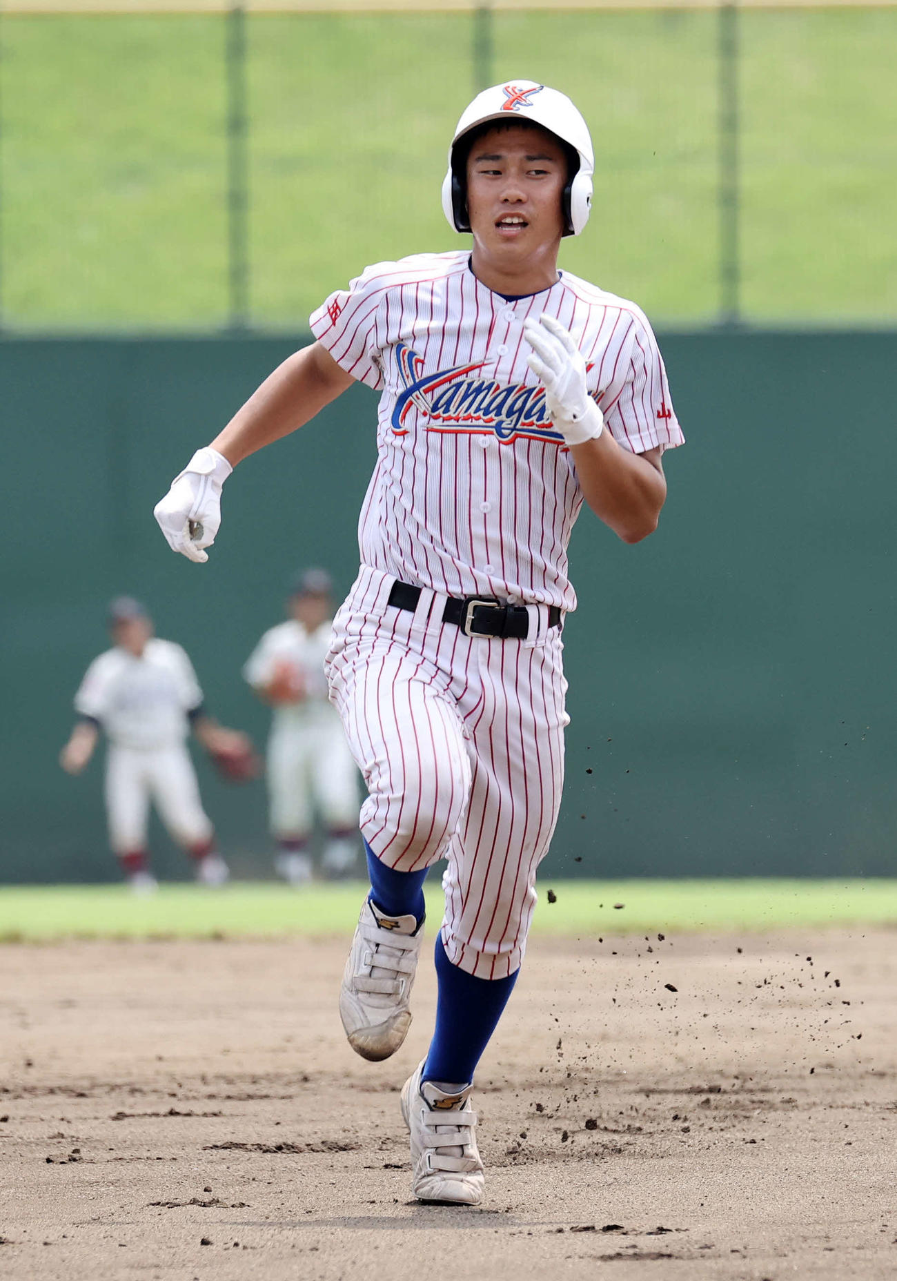 所沢西対山村学園　1回裏山村学園1死二塁、高野は右越え適時三塁打を放つ（撮影・鈴木正人）