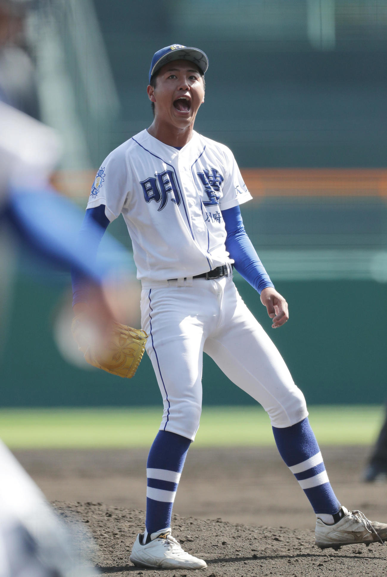 明豊対中京大中京　4回裏中京大中京2死一、三塁、櫛田を空振り三振に仕留め、雄たけびをあげる太田（撮影・前田充）