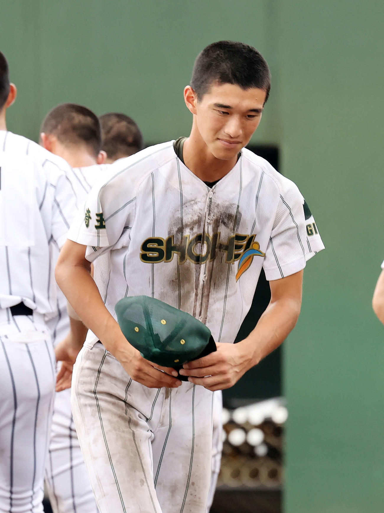 浦和学院対昌平　敗戦しベンチに引き揚げる昌平・吉野（撮影・鈴木正人）