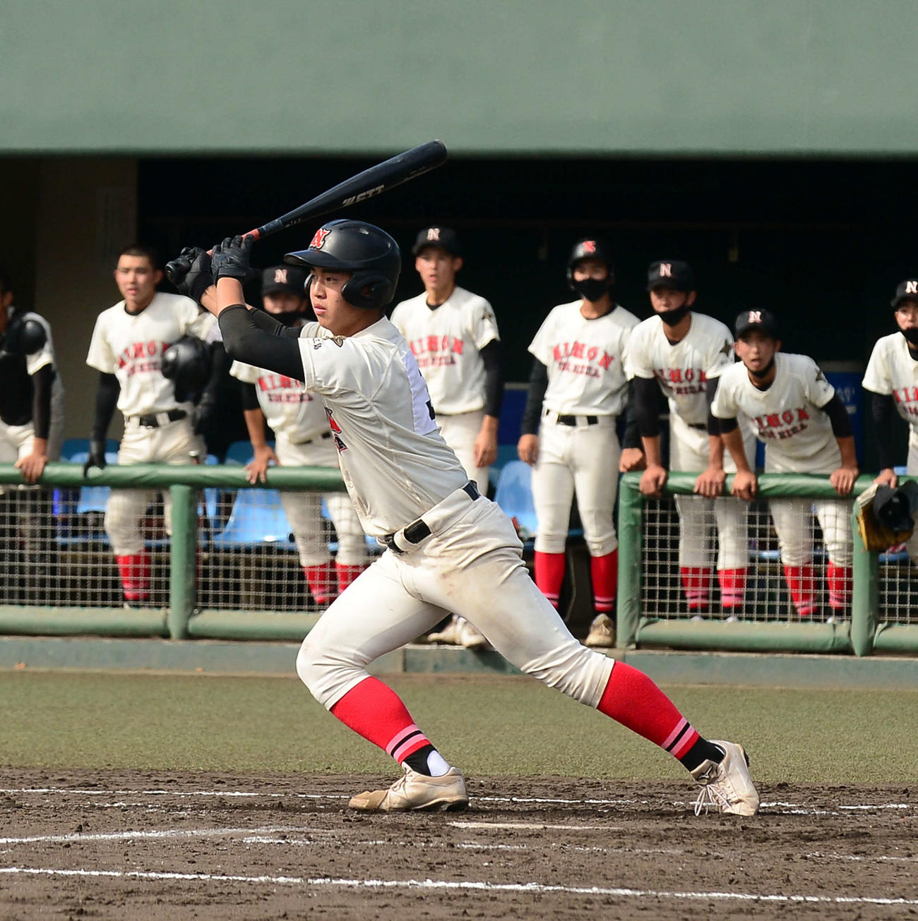 4回裏1死満塁、決勝の中前2点適時打を放つ日大三島・池口