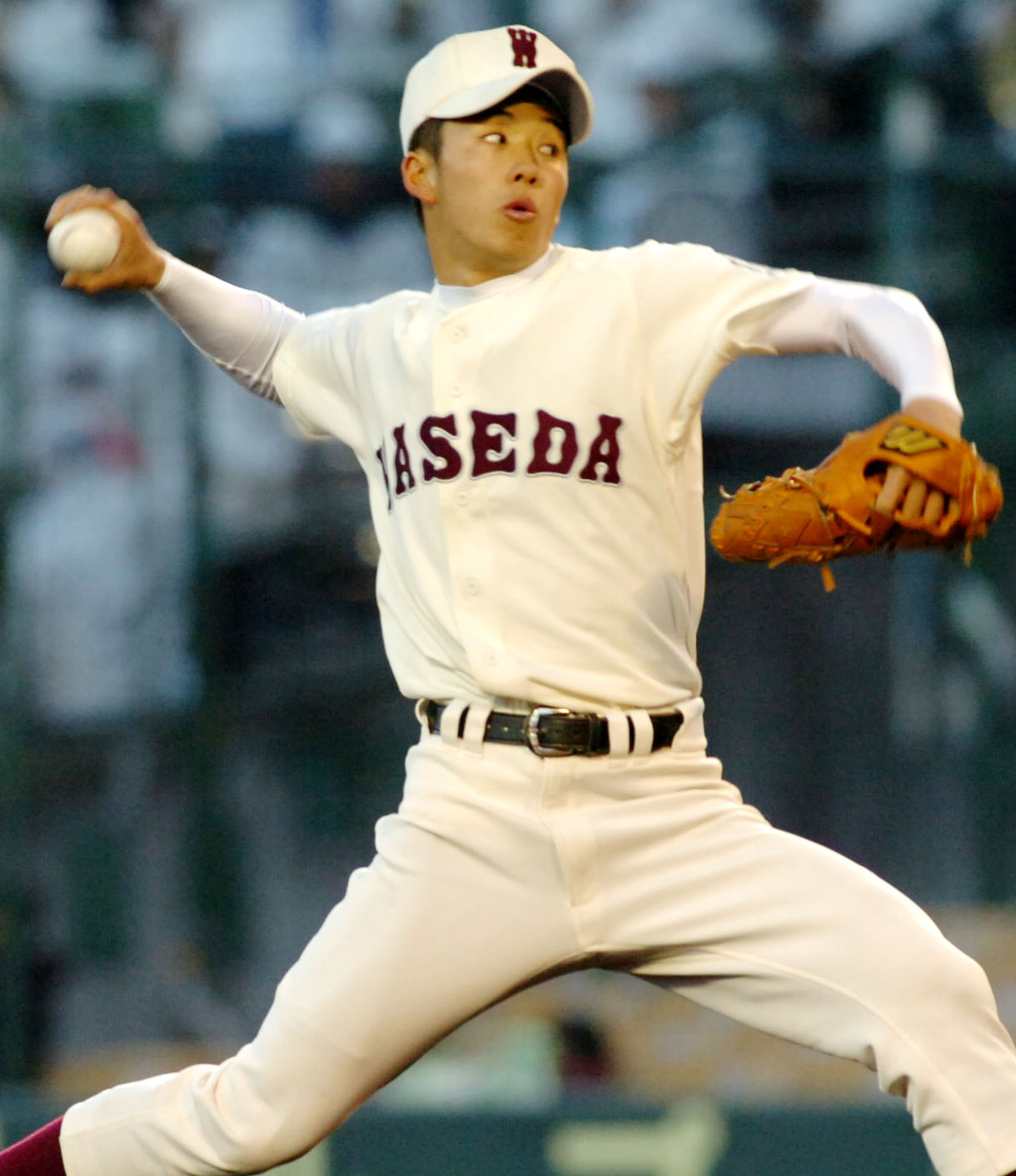 06年3月、センバツで引き分け再試合の関西戦に先発する早実・斎藤