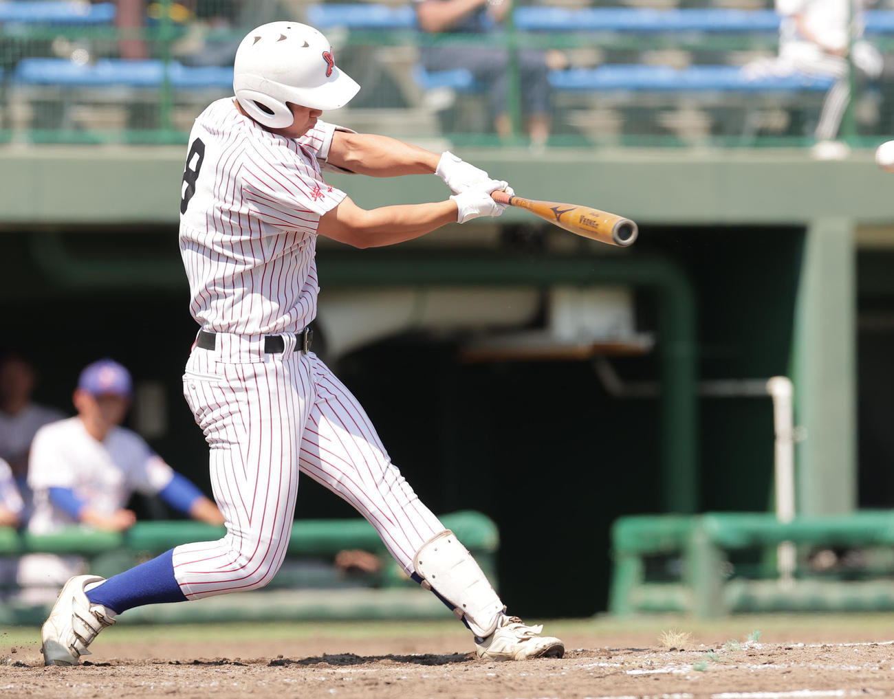 山村学園対作新学院　4回表山村学園無死二塁、左中間適時三塁打を放つ酒井（撮影・野上伸悟）
