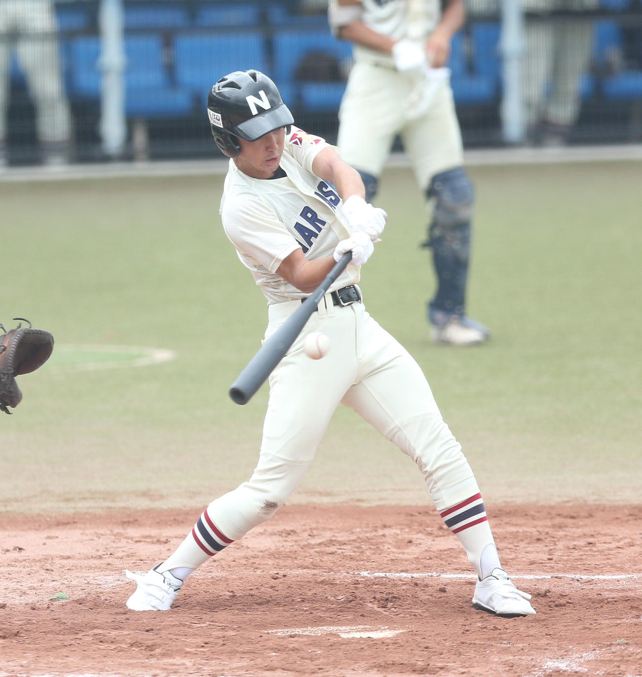 船橋対習志野　2回裏習志野2死満塁、2点適時二塁打を放つ川野（撮影・宮地輝）