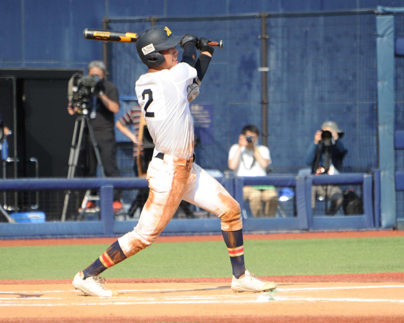 日本文理の竹野は6回表2死三塁から右中間に適時二塁打。チーム7点目をたたき出す