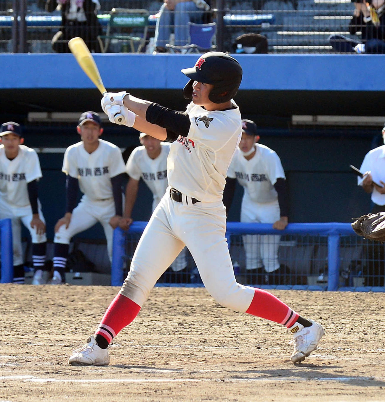 延長13回1死満塁、サヨナラ左犠飛を放つ日大三島・野口