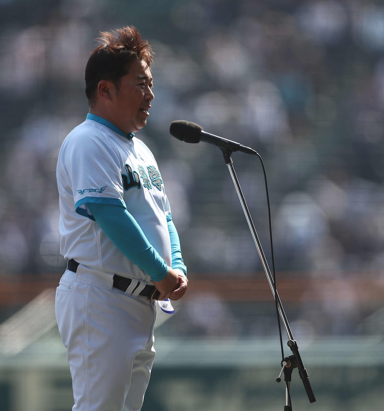 報徳学園対山梨学院　優勝インタビューに答える山梨学院・吉田監督（撮影・河田真司）