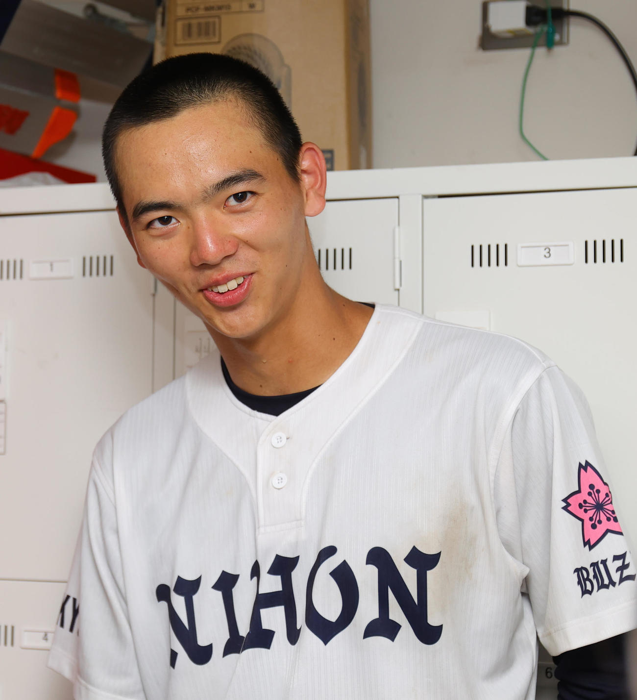 上野学園対日大豊山　水泳との二刀流の日大豊山・光永は、初戦を突破し笑顔で取材に応じる（撮影・野上伸悟）