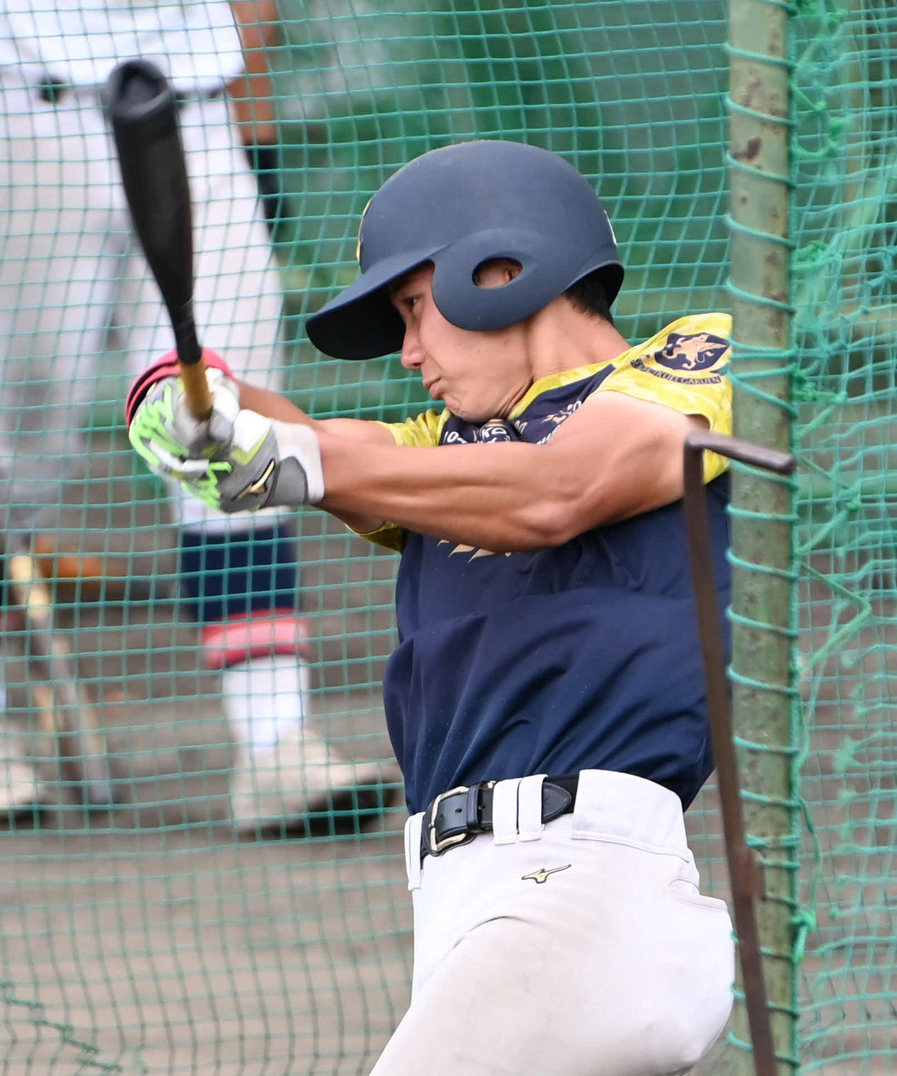 バッティング練習をする仙台育英・山田主将（撮影・石井愛子）