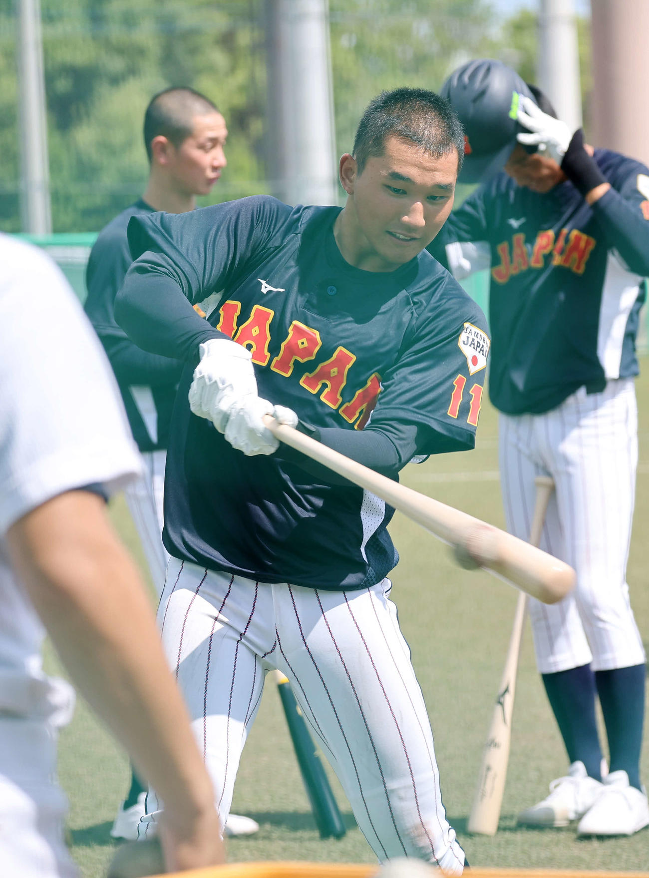 ティー打撃するU18日本代表・武田（撮影・鈴木正人）