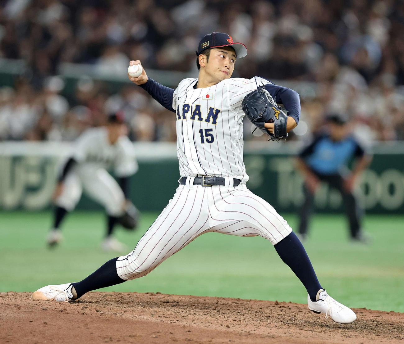 高校日本代表対大学日本代表　力投する高校日本代表7番手の高橋（撮影・鈴木正人）
