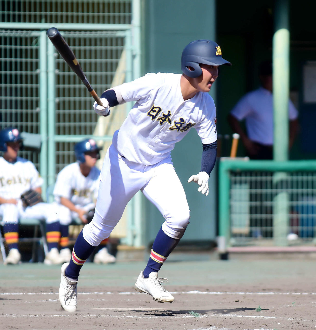5回表1死一、二塁で中前適時打を放った日本文理の主将・野口