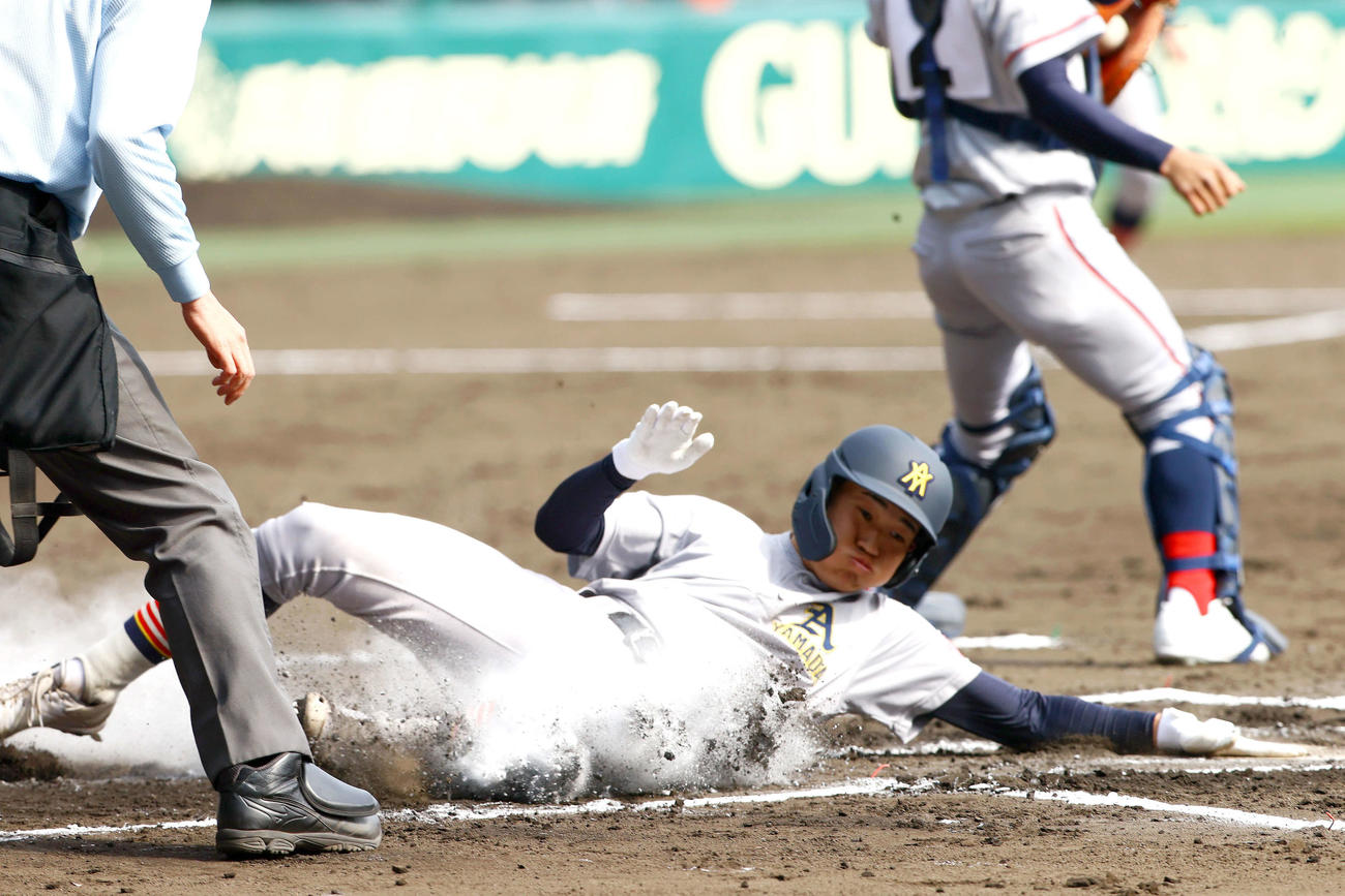 1回、二走佐藤隆は原田の右適時打で先制の生還