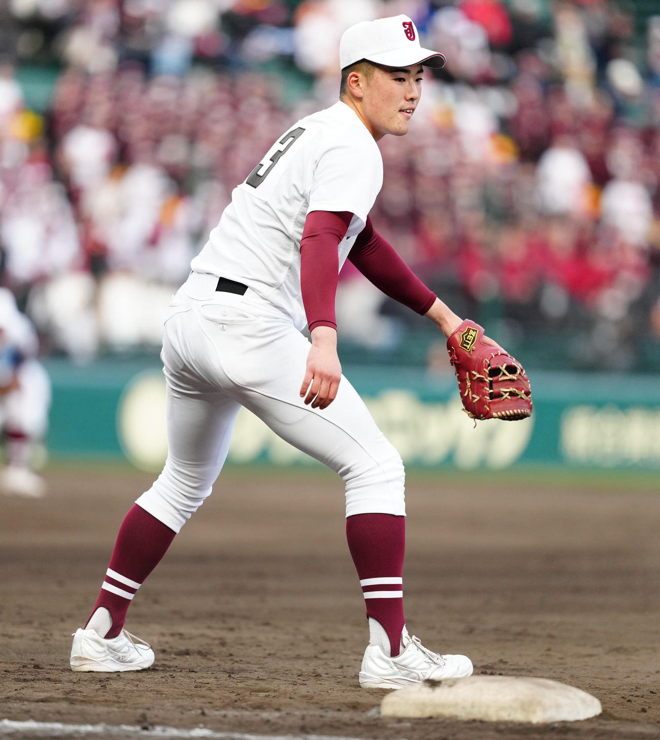 報徳学園対常総学院　4回表報徳学園2死三塁、間木の三塁適時内野安打となった送球を捕れなかった一塁手武田（撮影・江口和貴）