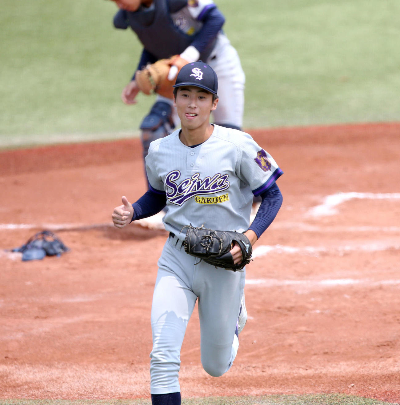 聖和学園対東北学院　6回裏東北学院2死二、三塁のこの日最大のピンチを無失点で切り抜け、笑みがこぼれる聖和学園・斎藤佑（撮影・木村有優）