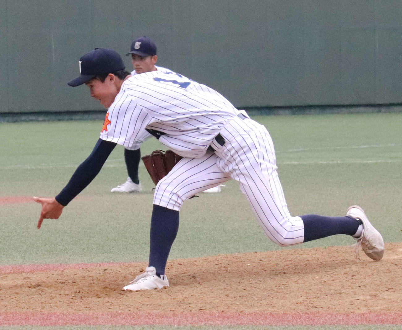 東北対石巻工　サヨナラ勝ちを呼び込む好投を見せた東北・堀江　（撮影・黒須亮）