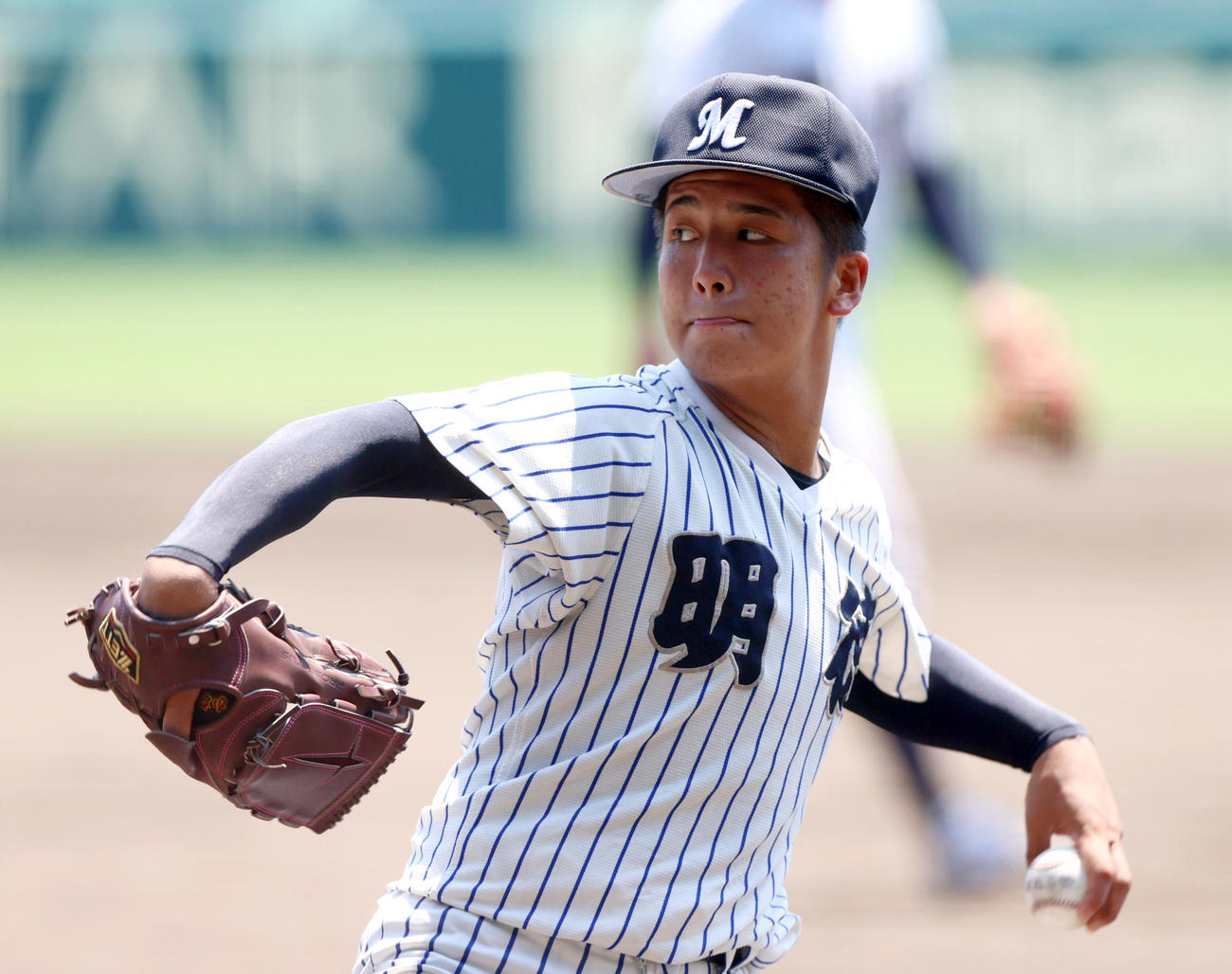 甲子園練習でキャッチボールする明徳義塾・内山（撮影・上山淳一）