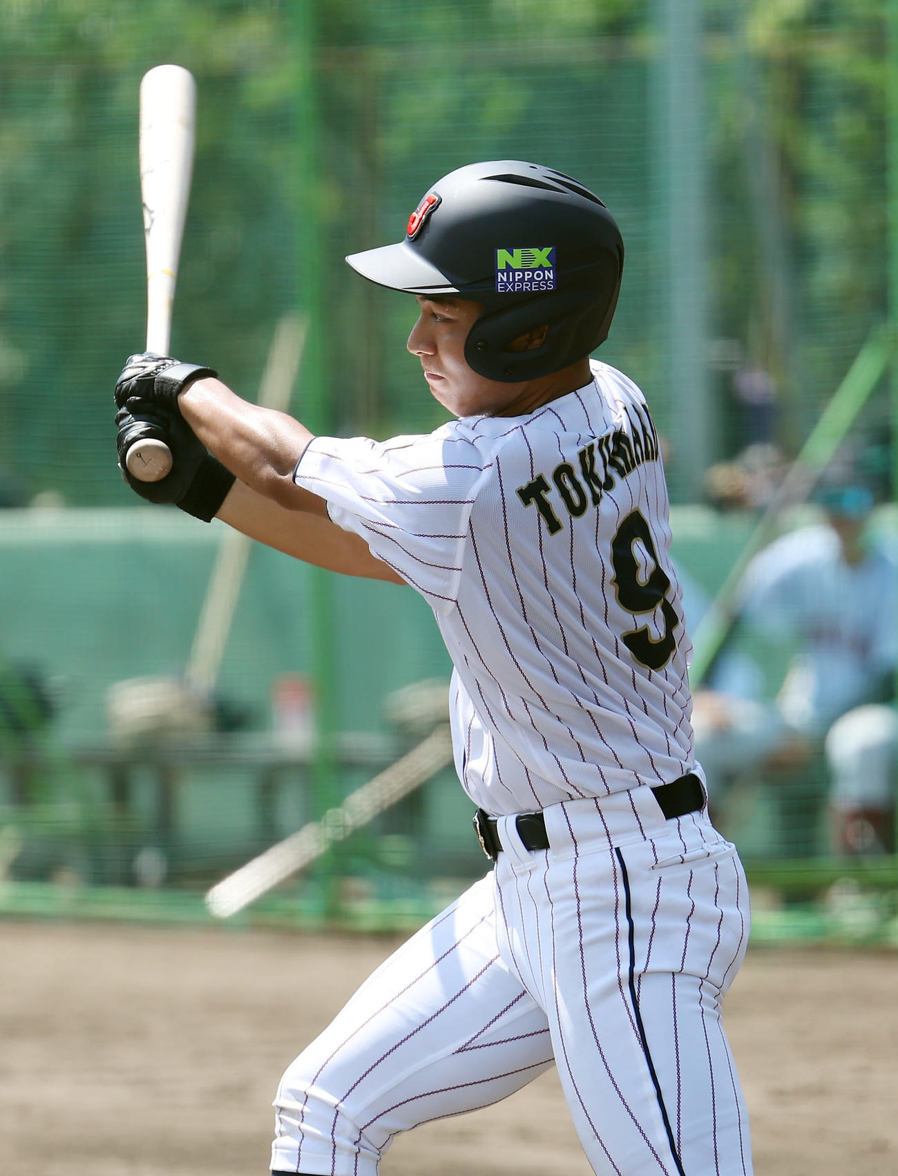 近大との練習試合で右前適時打を放つ徳丸（撮影・前田充）