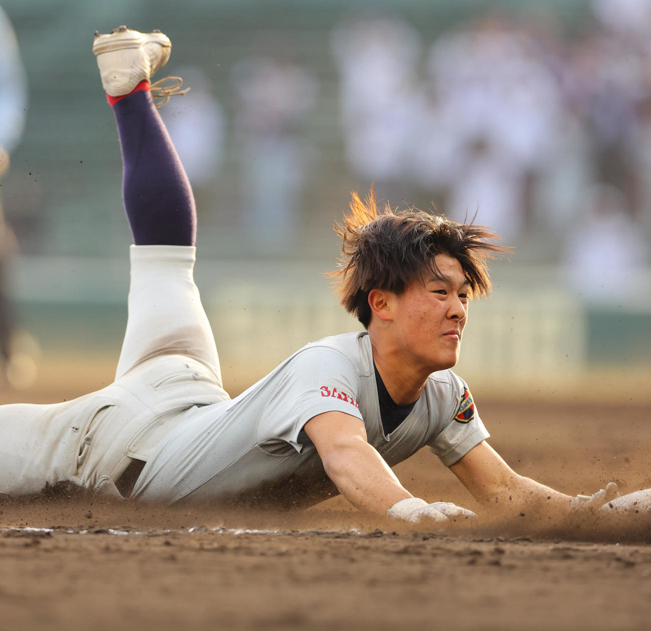 浦和実対東海大札幌　8回表浦和実無死、佐々木は右三塁打を放ち三塁にヘッドスライディングする（撮影・上山淳一）