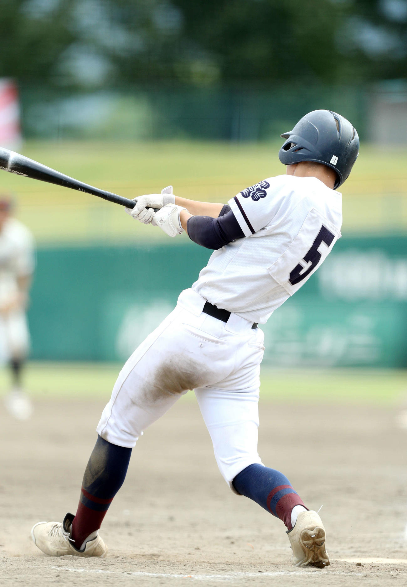 北村山・谷地・上山明新館対米沢東　5回裏米沢東2死一、二塁、左前適時打を放つ米沢東・佐々木（撮影・木村有優）