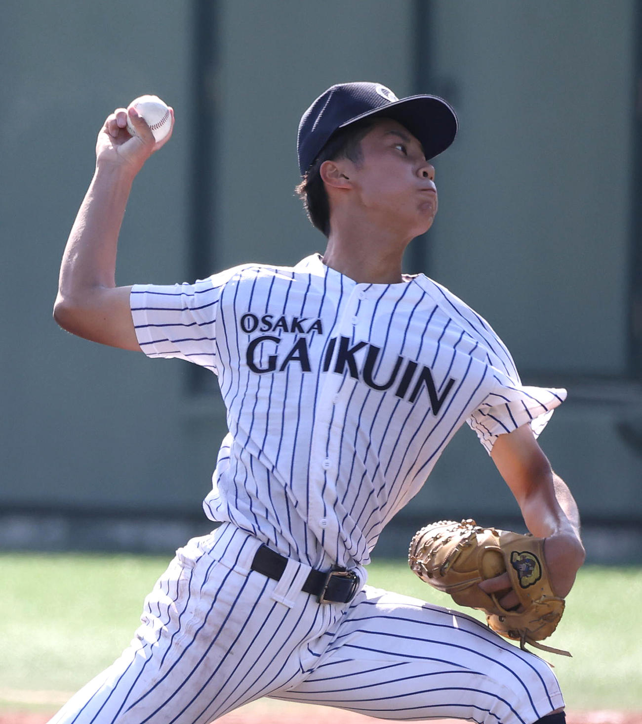 北かわち皐が丘戦に3番手で力投する大院大高・林将輝（撮影・白石智彦）