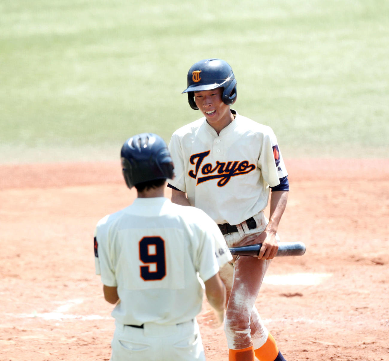 東北生活文化大高対東陵　5回に生還する東陵・幸（撮影・木村有優）
