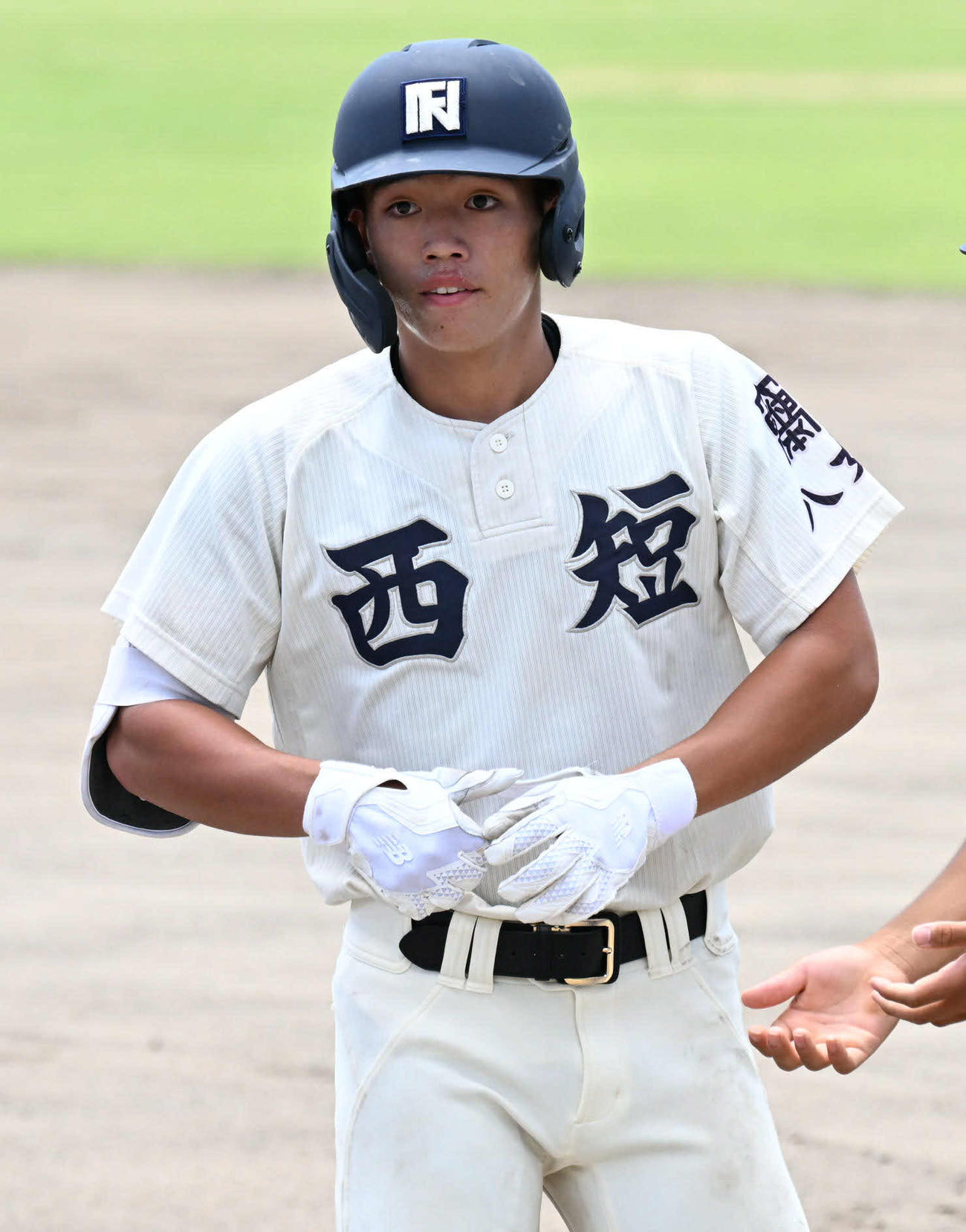 福岡工対西日本短大付　7回裏西日本短大付1死二塁、斉藤は適時打を放つ（撮影・林敢治）