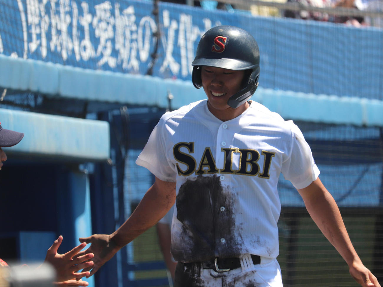 愛媛大会決勝　松山商対済美　2回裏1死一、三塁で済美・亀山の二ゴロの間に本塁に生還した、滝川（撮影・中島麗）