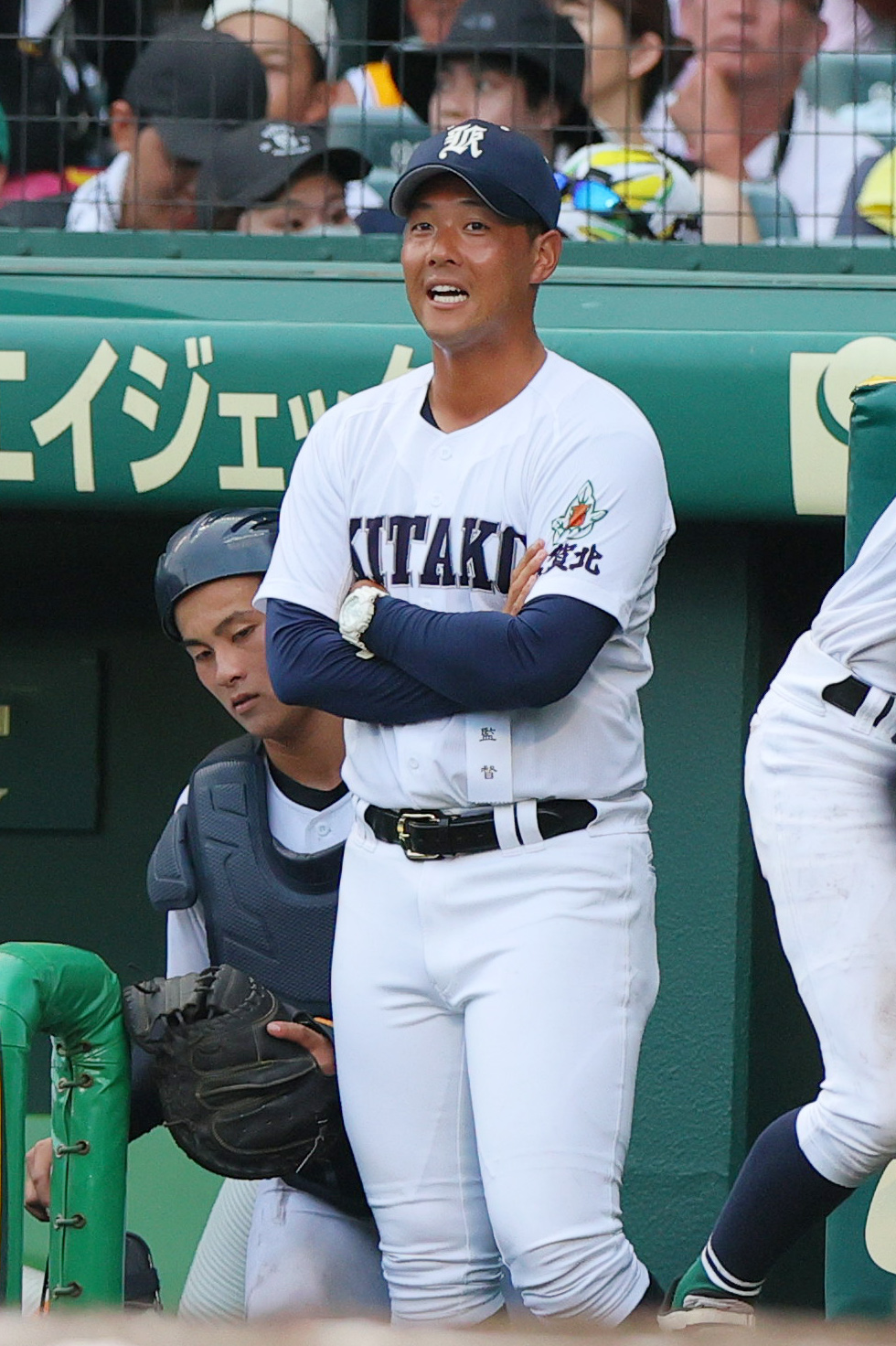 佐賀北対明豊　ベンチで笑顔を見せる佐賀北の本村監督（撮影・上山淳一）