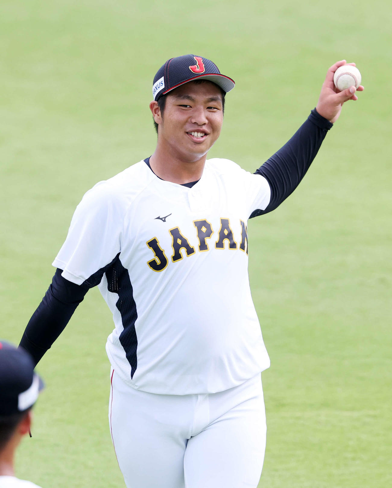 笑顔を見せる高校日本代表・末吉（撮影・鈴木正人）