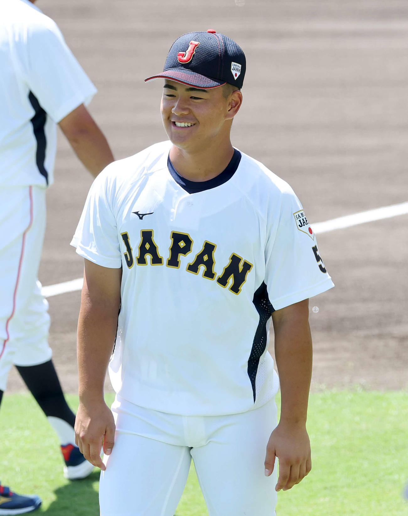 笑顔を見せる高校日本代表・為永（撮影・鈴木正人）