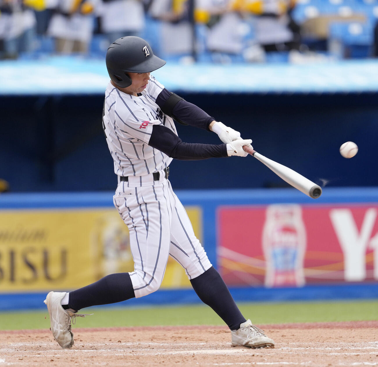 足立学園対岩倉　3回裏岩倉1死、左越え三塁打を放つ和田斉親（撮影・小島史椰）