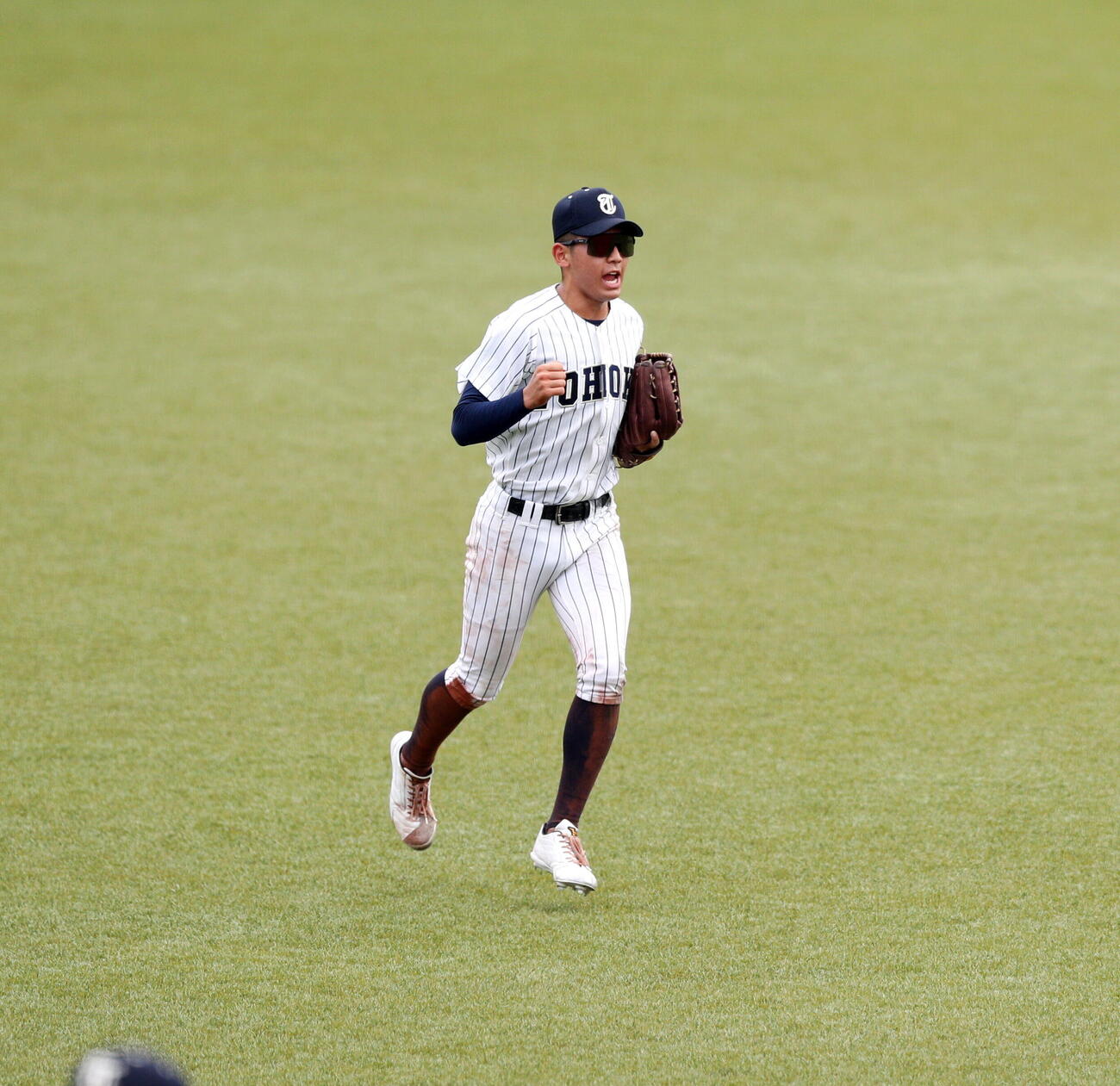 東北対石巻工　勝利しガッツポーズする東北・進藤翔愛（撮影・木村有優）
