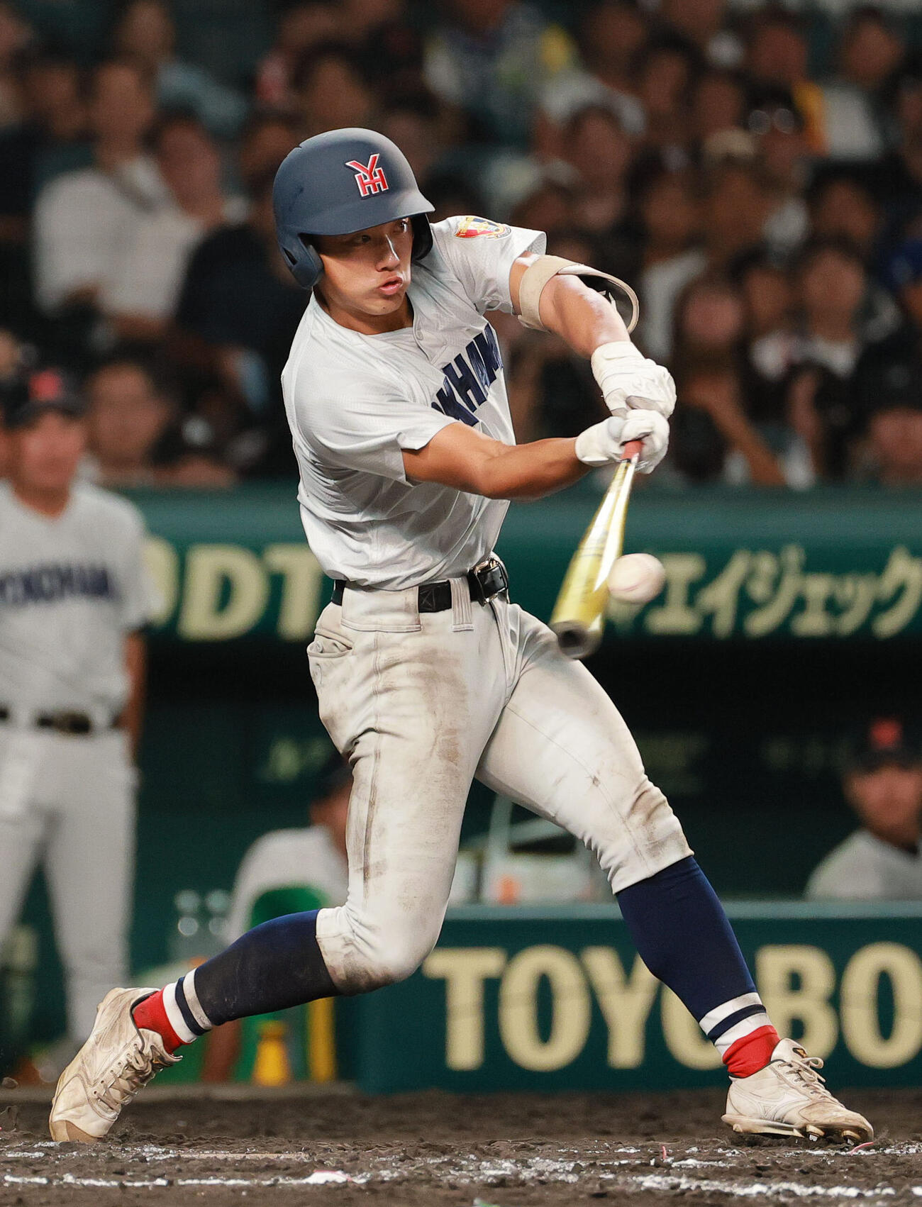 横浜対日南学園　7回表横浜2死二塁、千島大翼は適時三塁打を放つ（撮影・上山淳一）