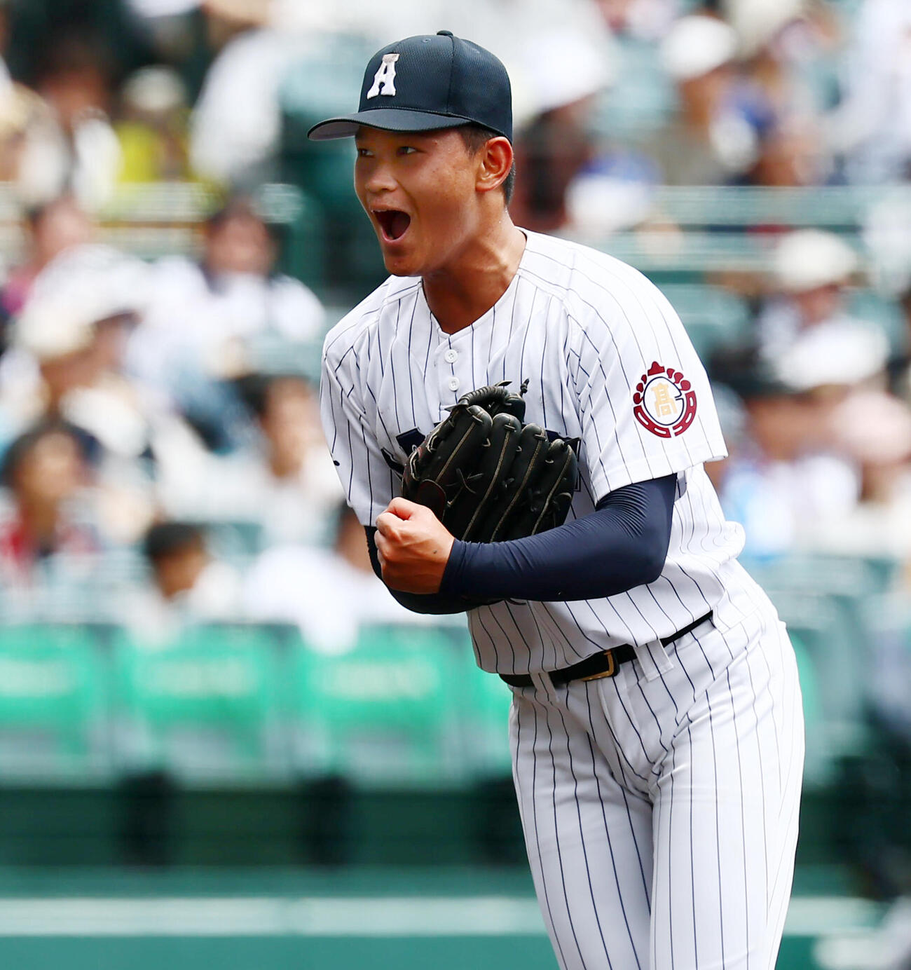 有明対東日本国際大昌平　7回裏東日本国際大昌平2死二塁、斉藤遼汰郎は小内壱晟を中飛に打ち取りガッツポーズを見せる（撮影・加藤哉）