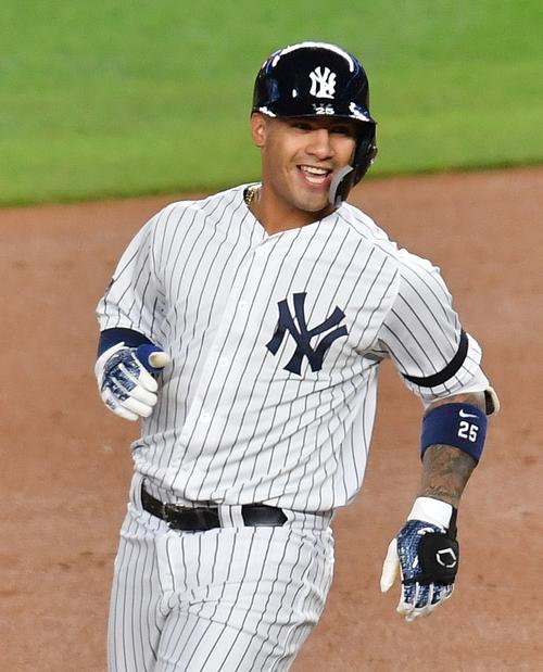 地区シリーズ・ヤンキース対ツインズ第1戦、5回裏ヤンキース1死満塁、左へ2点適時二塁打を放ち、笑顔を見せるヤンキース・トーレス（撮影・菅敏）