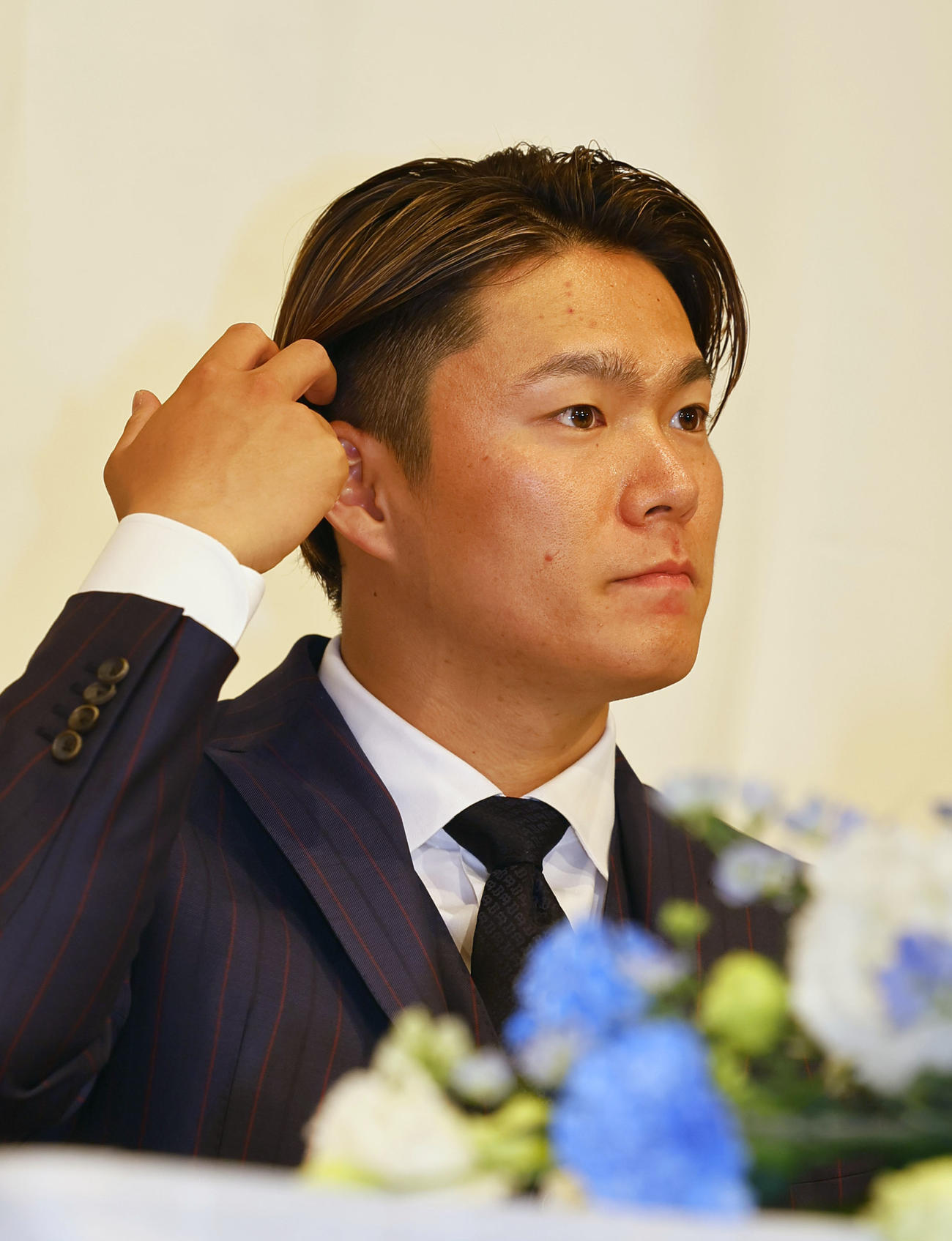 記者会見する米大リーグドジャースに入団が決まった山本（撮影・藤尾明華）