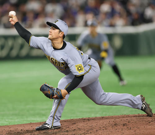 阪神対ドジャース　力投する阪神岡留（撮影・野上伸悟）