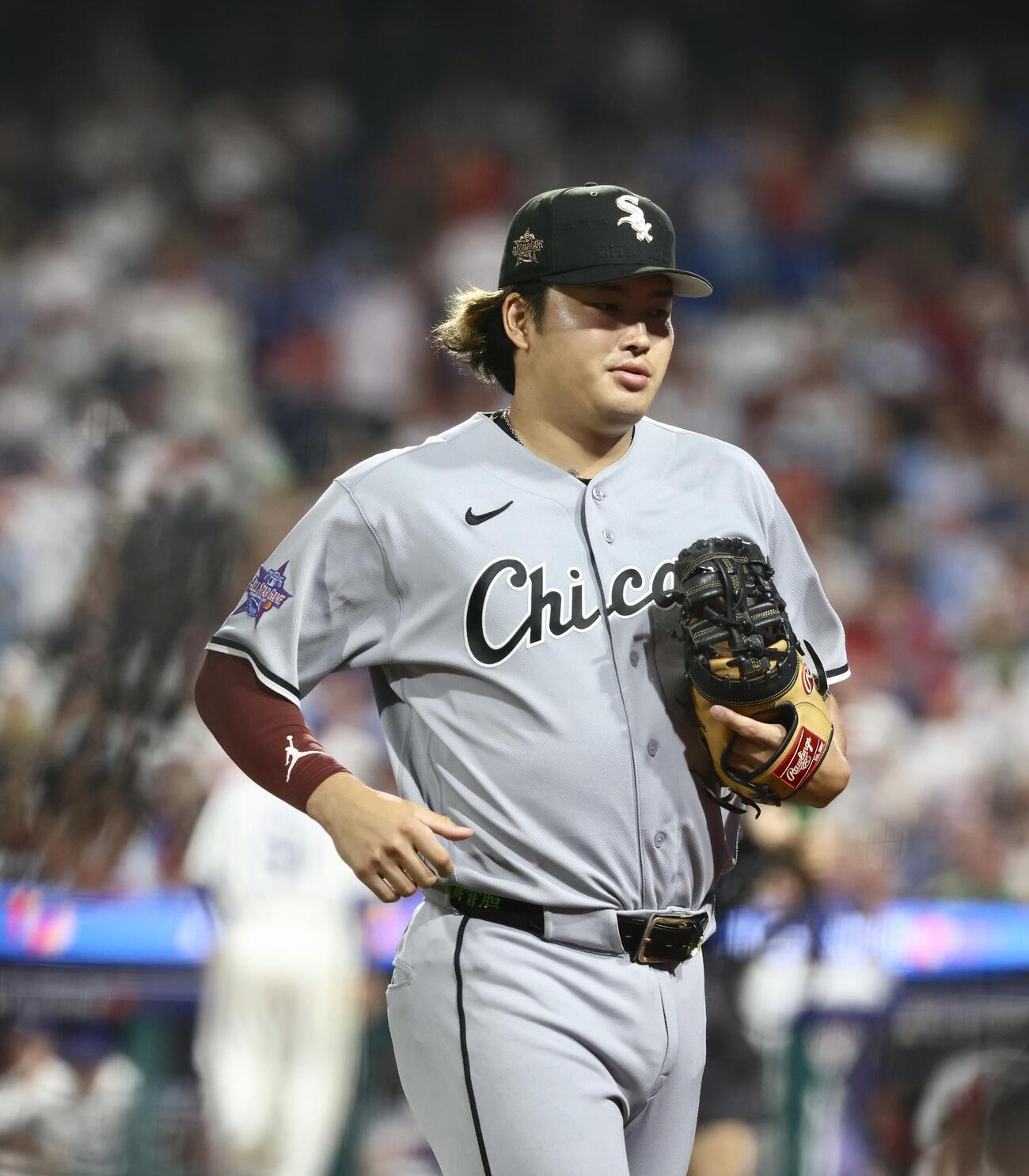 MLBオールスターゲーム　ナ・リーグ対ア・リーグ　7回裏を終えベンチに戻る村上宗隆（撮影・河田真司）