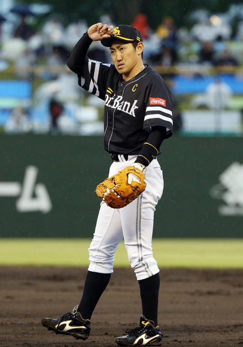 西武対ソフトバンク 雨と内川聖一(撮影・栗木一考)