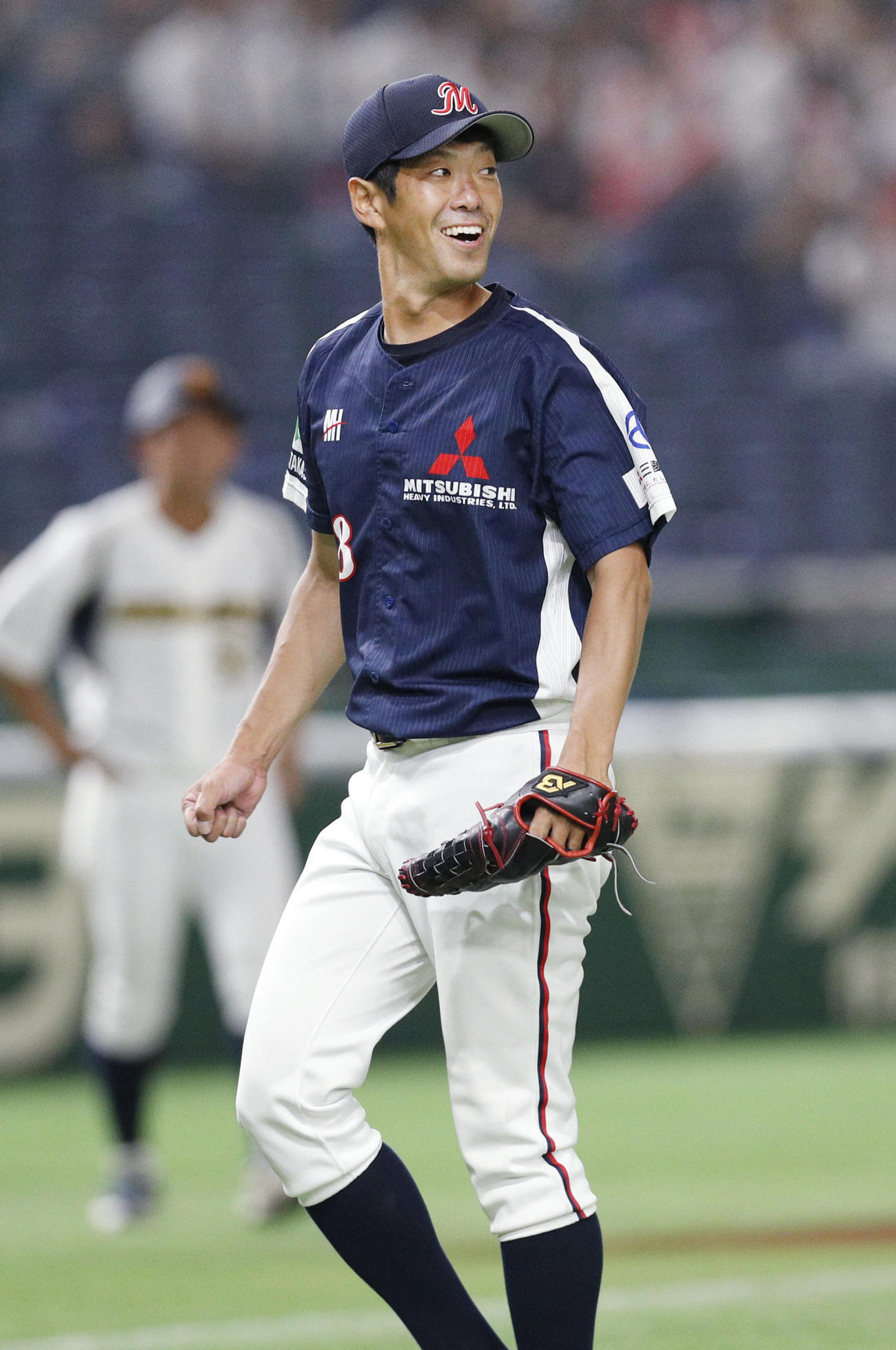 ２安打完封で勝利し、笑顔を見せる三菱重工神戸・高砂のエース守安（共同）