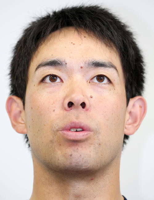 代表練習後、囲み会見でメジャー表明した西武・秋山は意思の強い表情を見せる（撮影・浅見桂子）