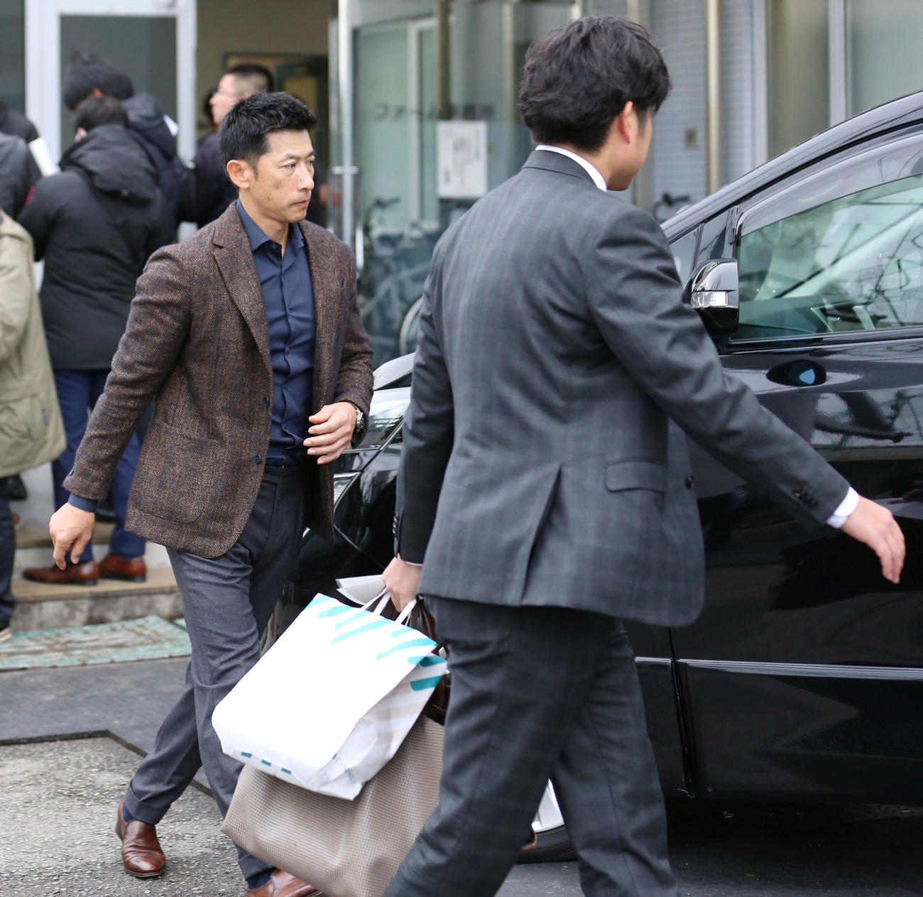 合同コーチ会議を終え引き揚げる矢野監督（撮影・上山淳一）