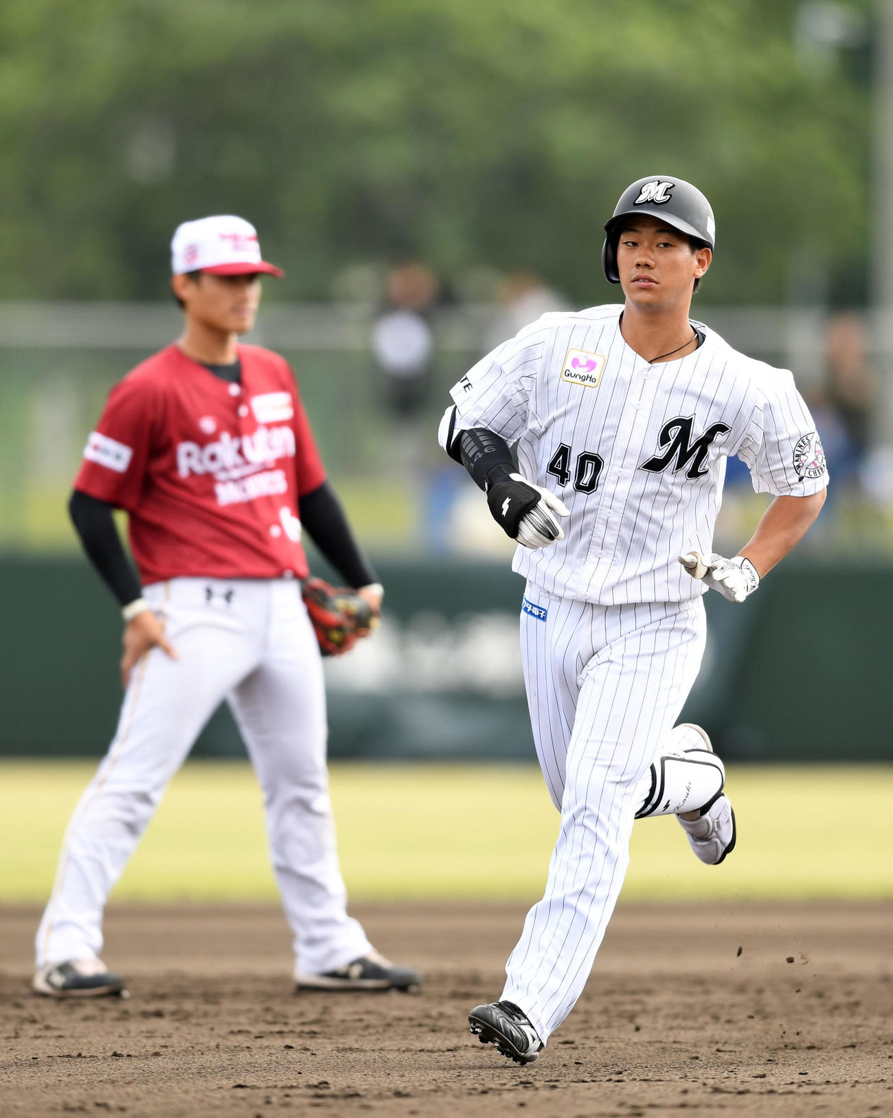 練習試合　ロッテ対楽天モンキーズ　6回裏ロッテ無死二塁、右中間へ2点本塁打を放つ福田光（撮影・横山健太）