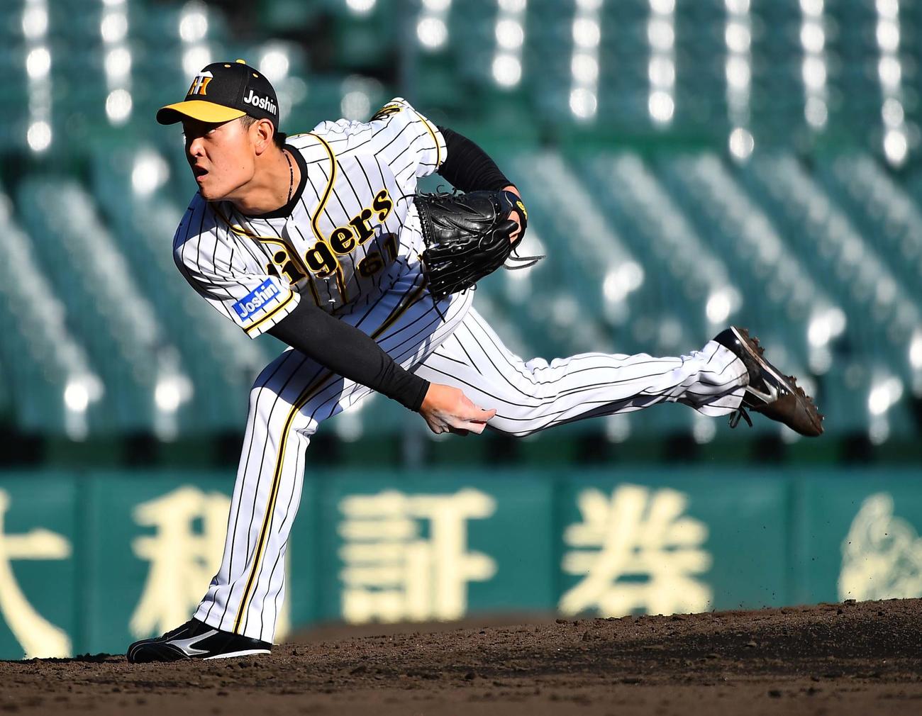 阪神対日本ハム　阪神4番手で登板する望月（撮影・上田博志）