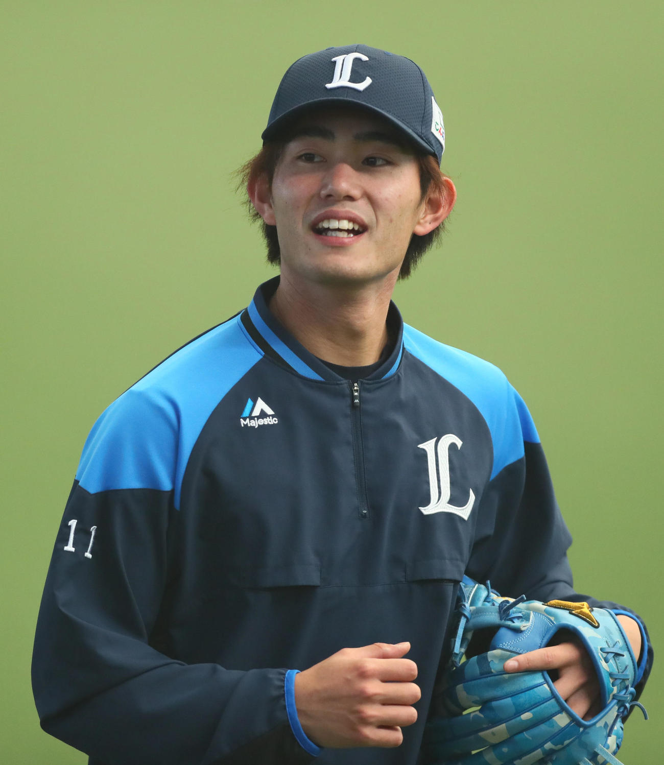練習を終え笑顔で引き揚げる西武今井（撮影・足立雅史）